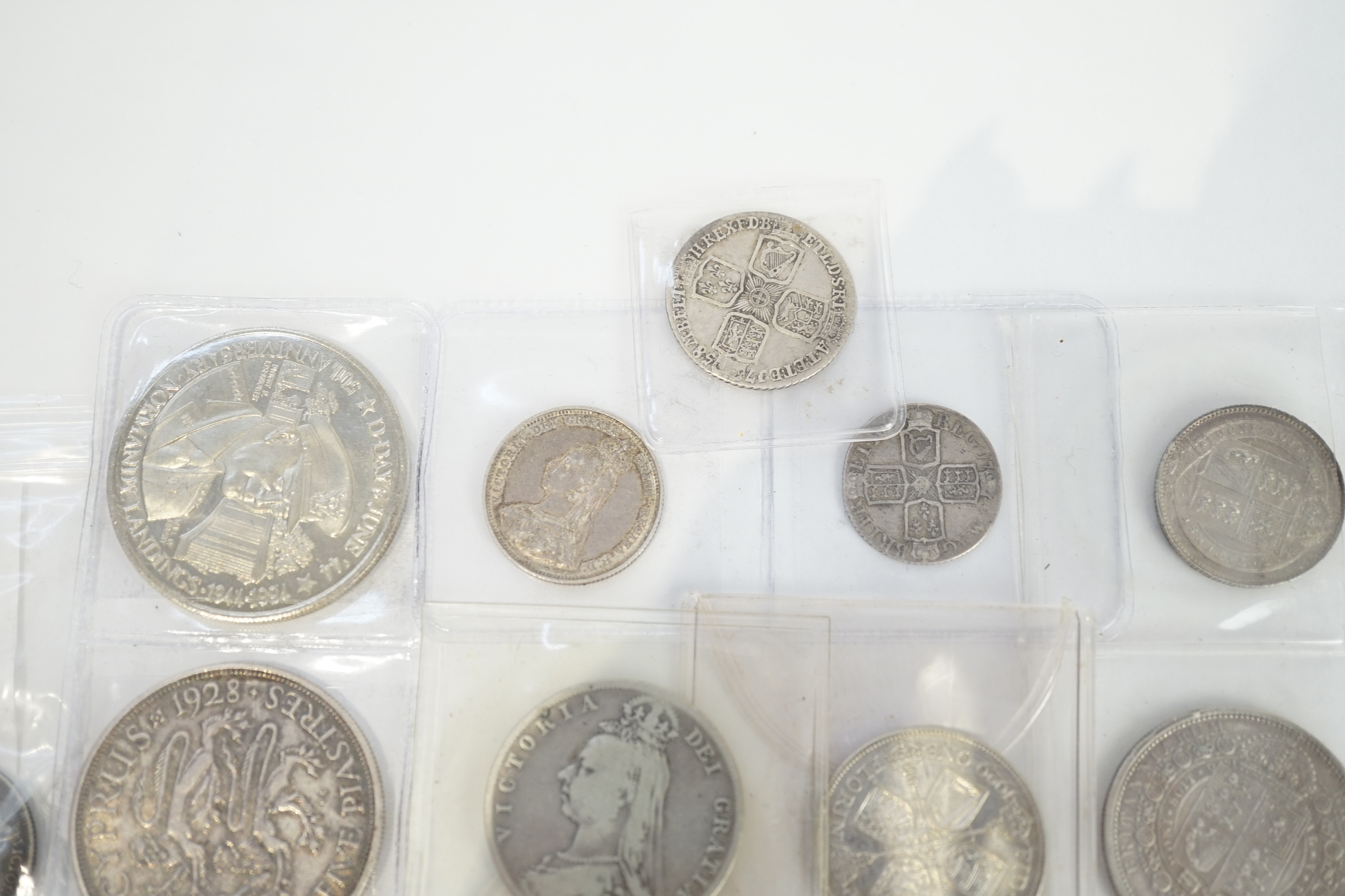 British and British crown dependency coins, 18th-20th century, to include George II shilling, 1758, fine or better, Anne sixpence, five halfcrowns, 1888, good VF, 1887, VF, 1889, 1883 and 1930, two florins, 1887, EF, 192